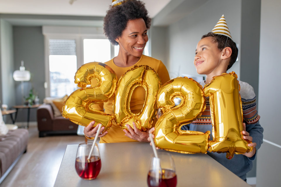 Mother and son celebrating New Year 2021 at home