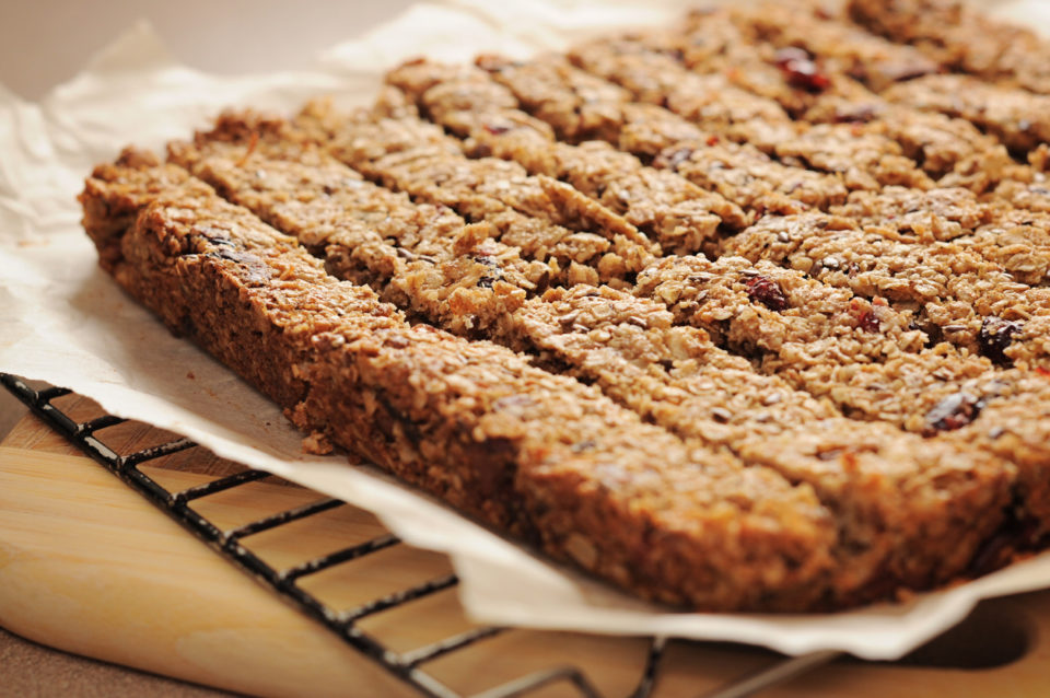 Granola bars, cut on parchment, delicious and healthy snack!