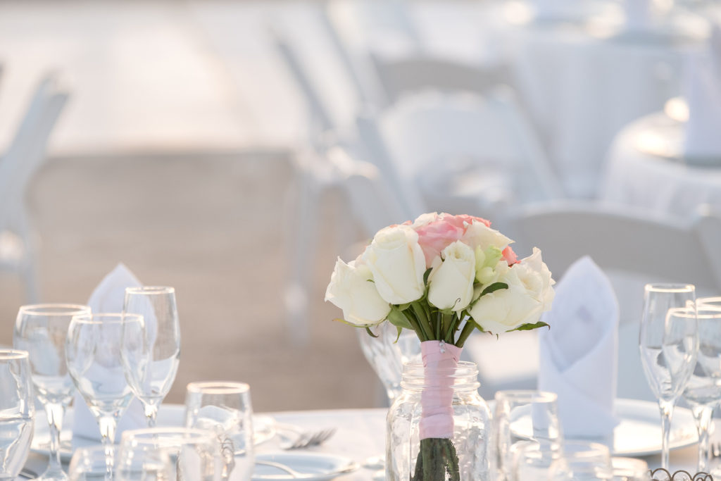 Bouquet on white table on bright background