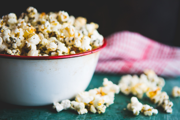 Homemade popcorn filled with spices and grains. Perfect snack for movie days at home.