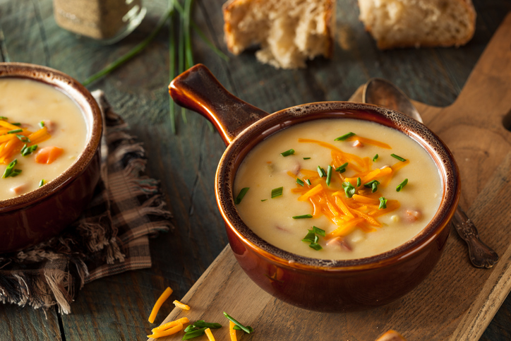 Homemade Beer Cheese Soup with Chives and Bread