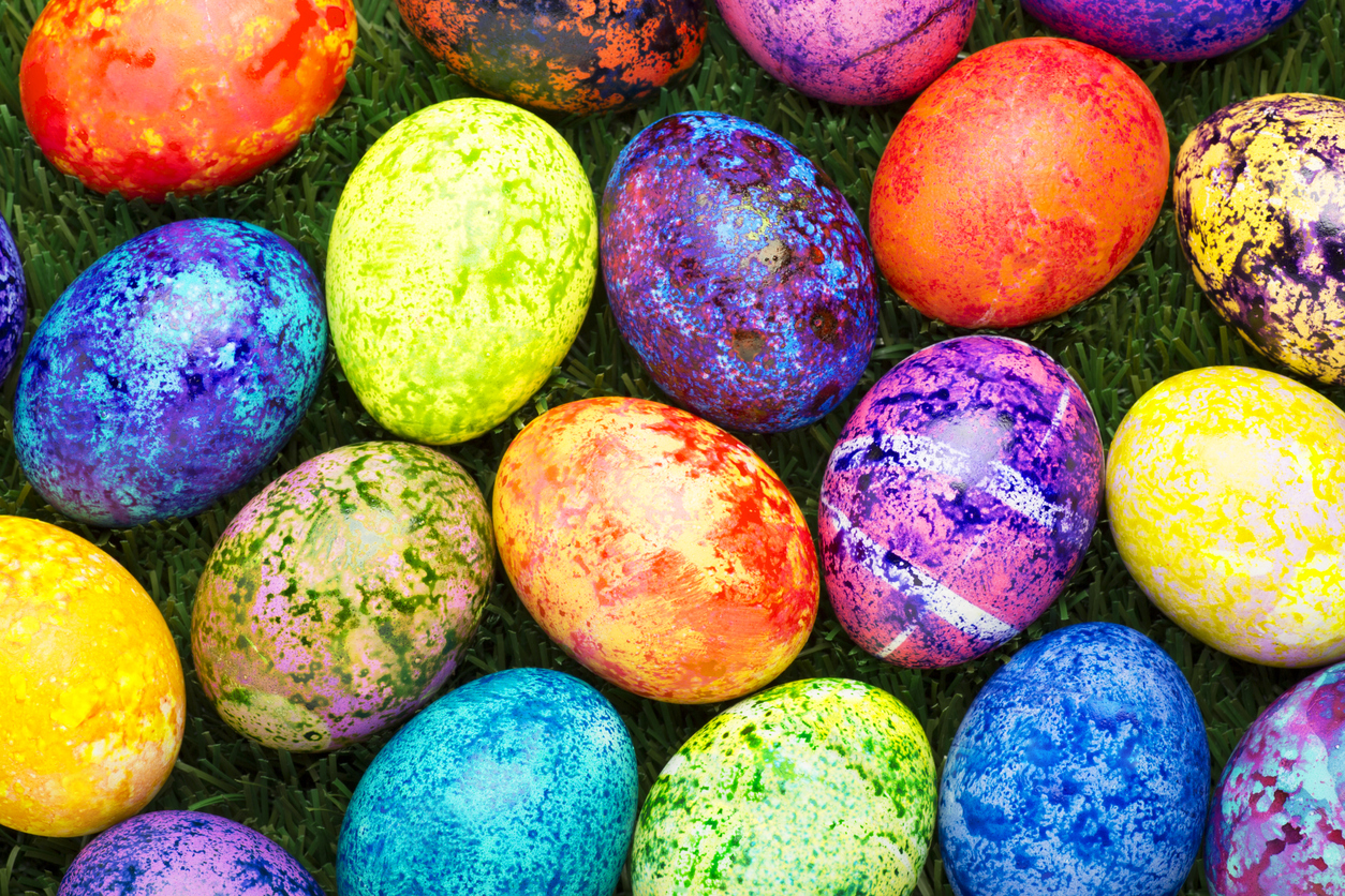 ALot of Colorful Speckled Easter Egg on Green Grass